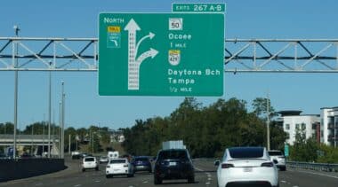 Building networks of managed lanes in big cities to reduce traffic congestion