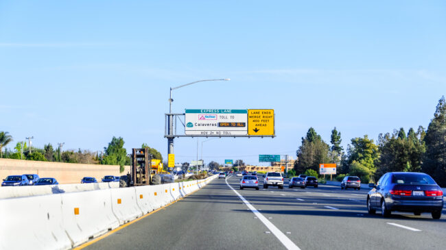 Converting high occupancy vehicle lanes to high occupancy toll lanes or express toll lanes